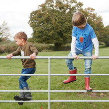 Load image into Gallery viewer, 2 boys wearing leaf design t-shirt climbing a gate, Future Dendrologists. Learn about the trees and leaves