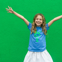 Load image into Gallery viewer, girl wearing t-shirt she's designed
