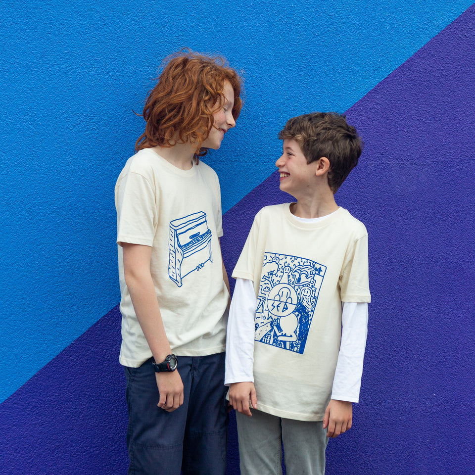 Two boys wearing their new designed t-shirts